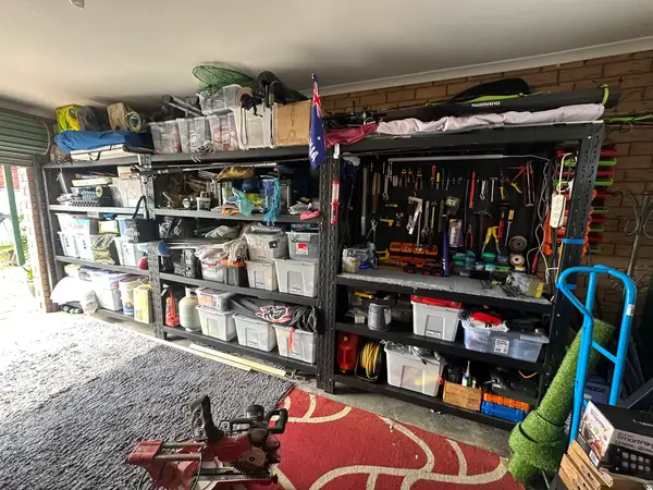 Garage shelves with tools and storage boxes