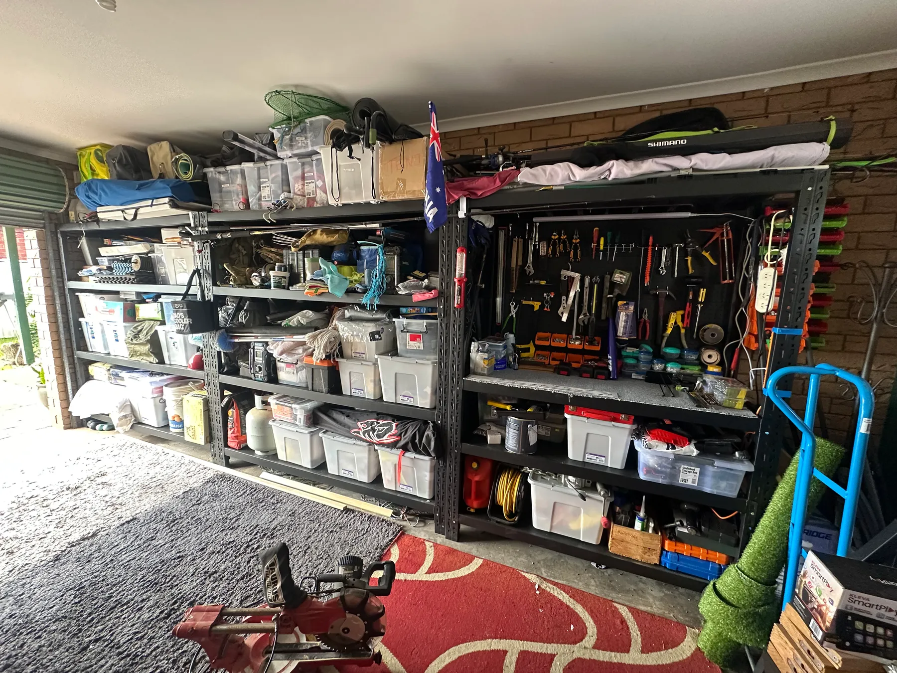 Garage shelves with tools and storage boxes